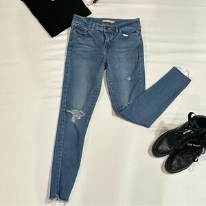 710 Levi's Blue Skinny Jeans with Fashionable Distressing